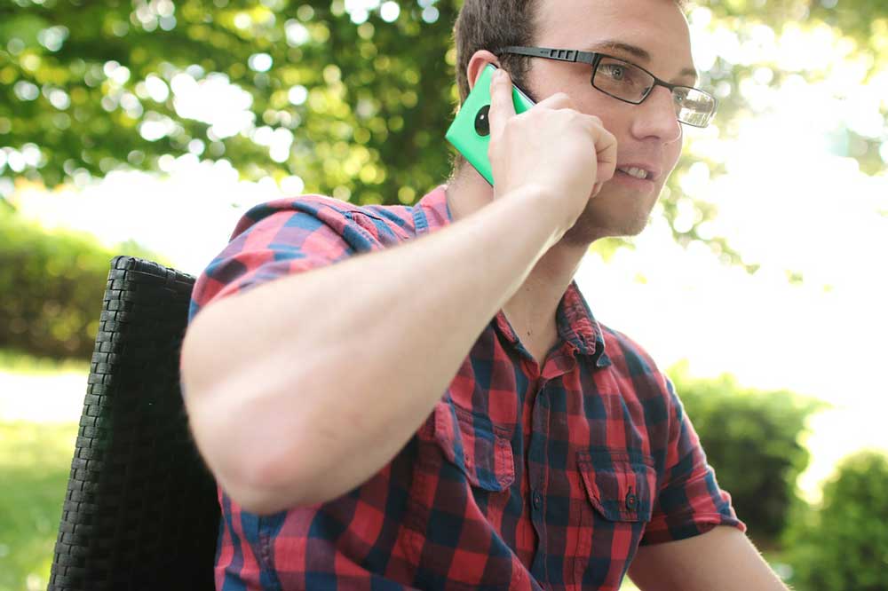 Young man talking on cell phone